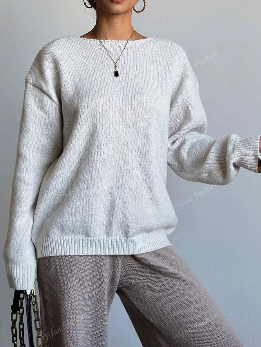 BEŻOWY SWETER KOKARDY 