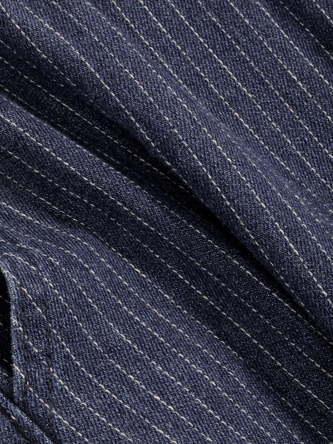 niebieskie spodnie jeans wzór paski