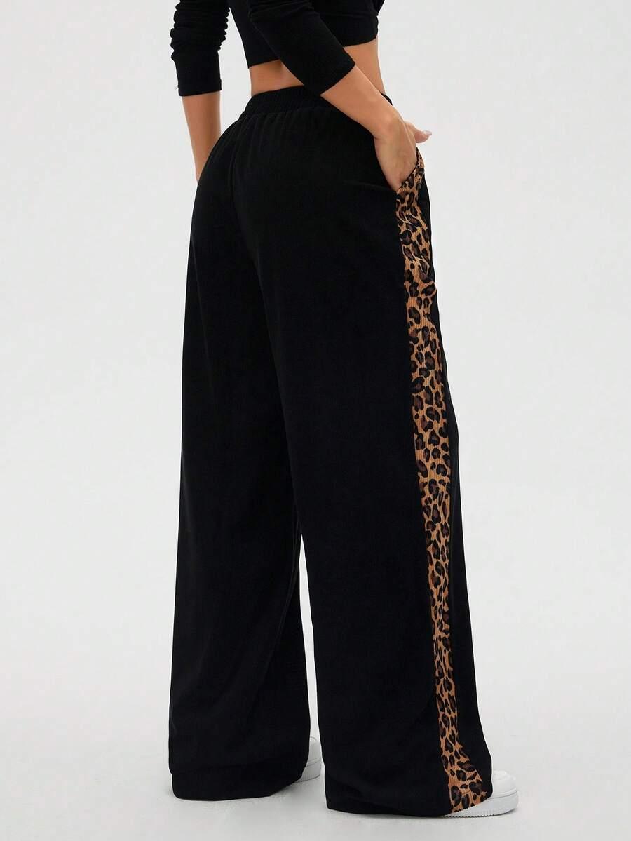 SPODNIE SZEROKA NOGAWKA ANIMAL PRINT