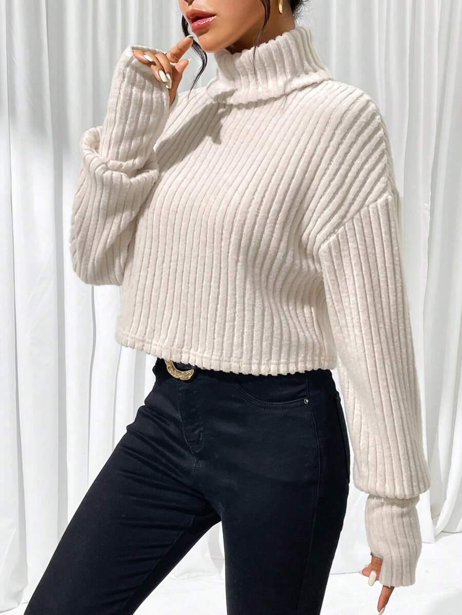 beżowy sweter golf