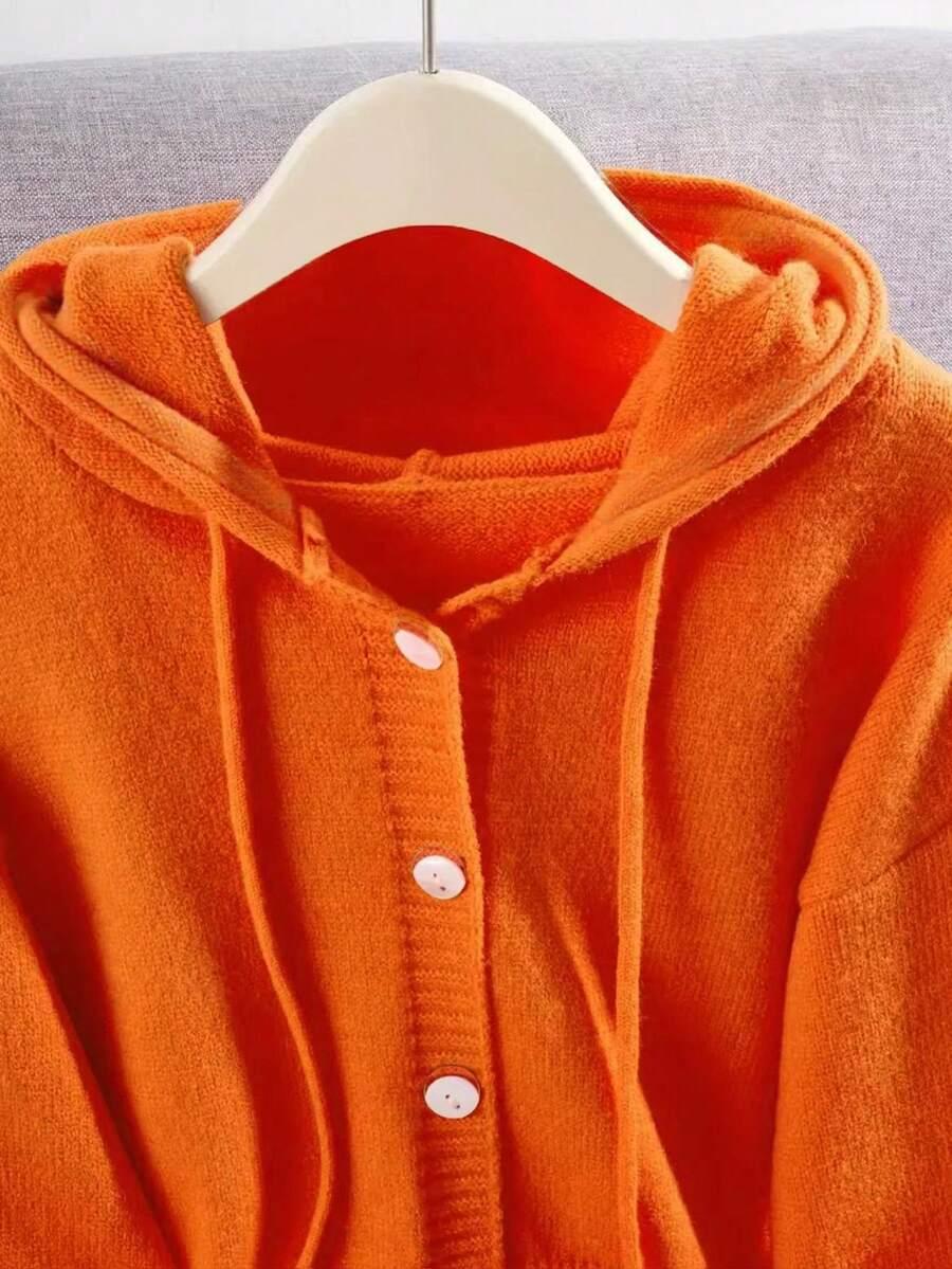 pomarańczowy sweter z kapturem