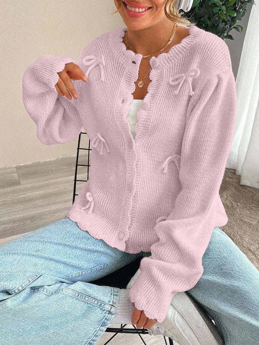 RÓŻOWY SWETER GUZIKI