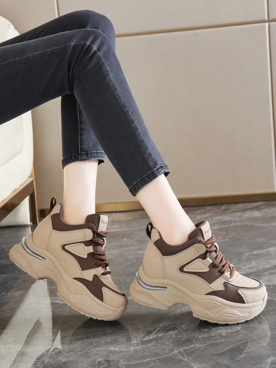sznurowane buty sportowe