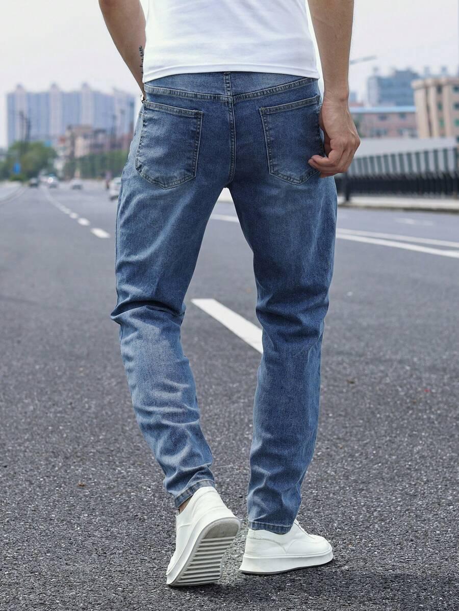 spodnie jeans zwężana nogawka 