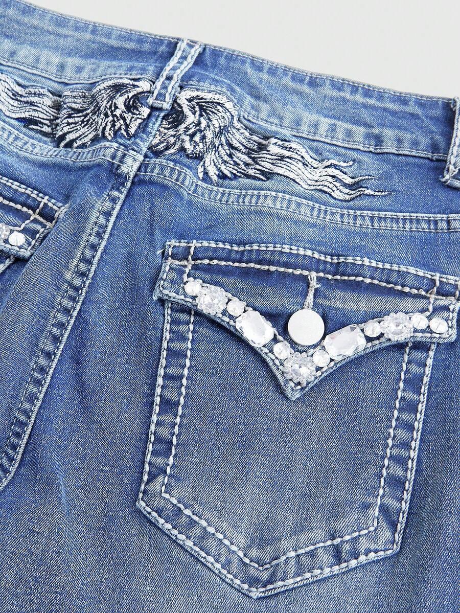 niebieskie spodnie jeans zdobienie