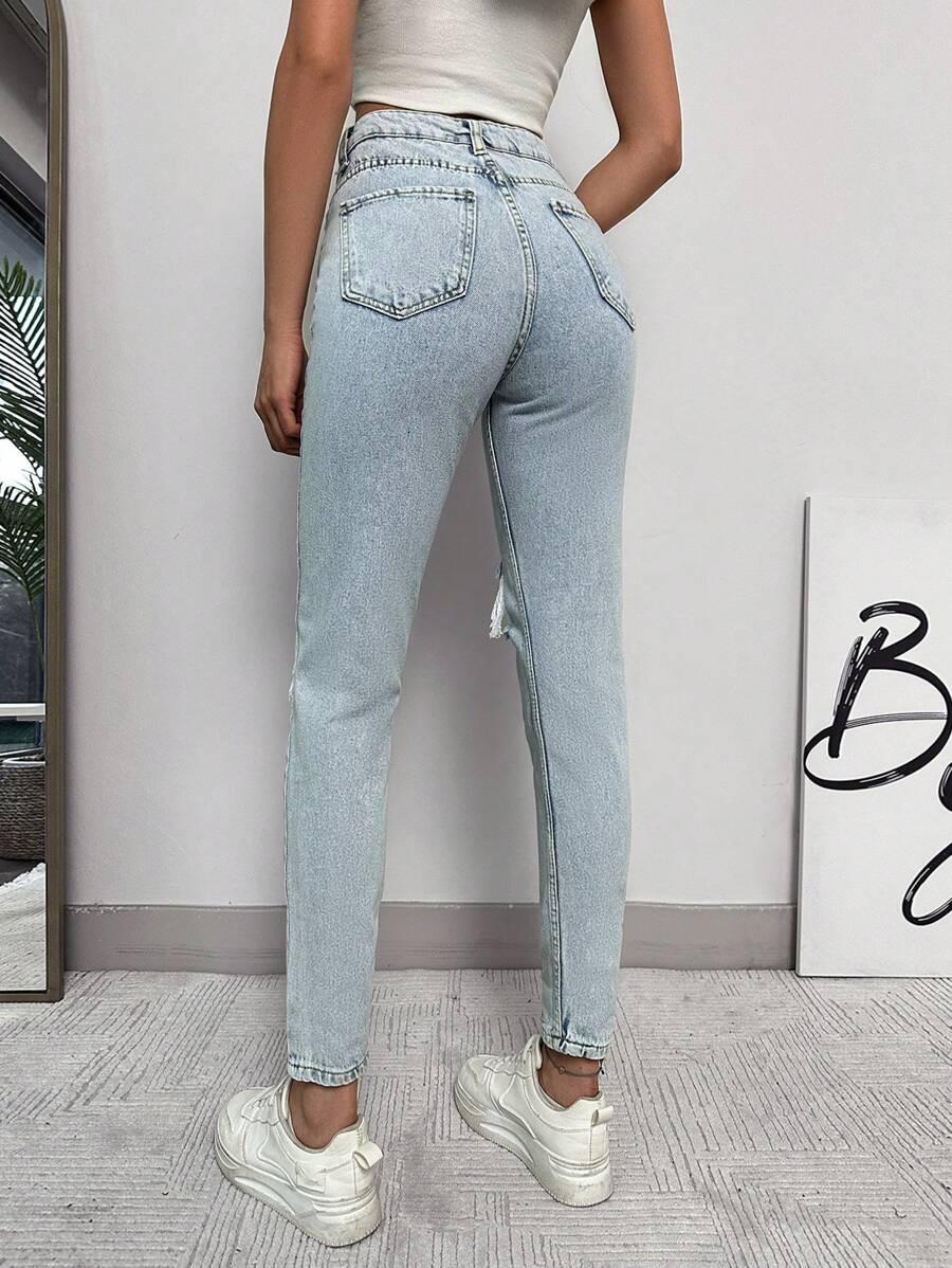 NIEBIESKIE SPODNIE JEANS PRZETARCIA 