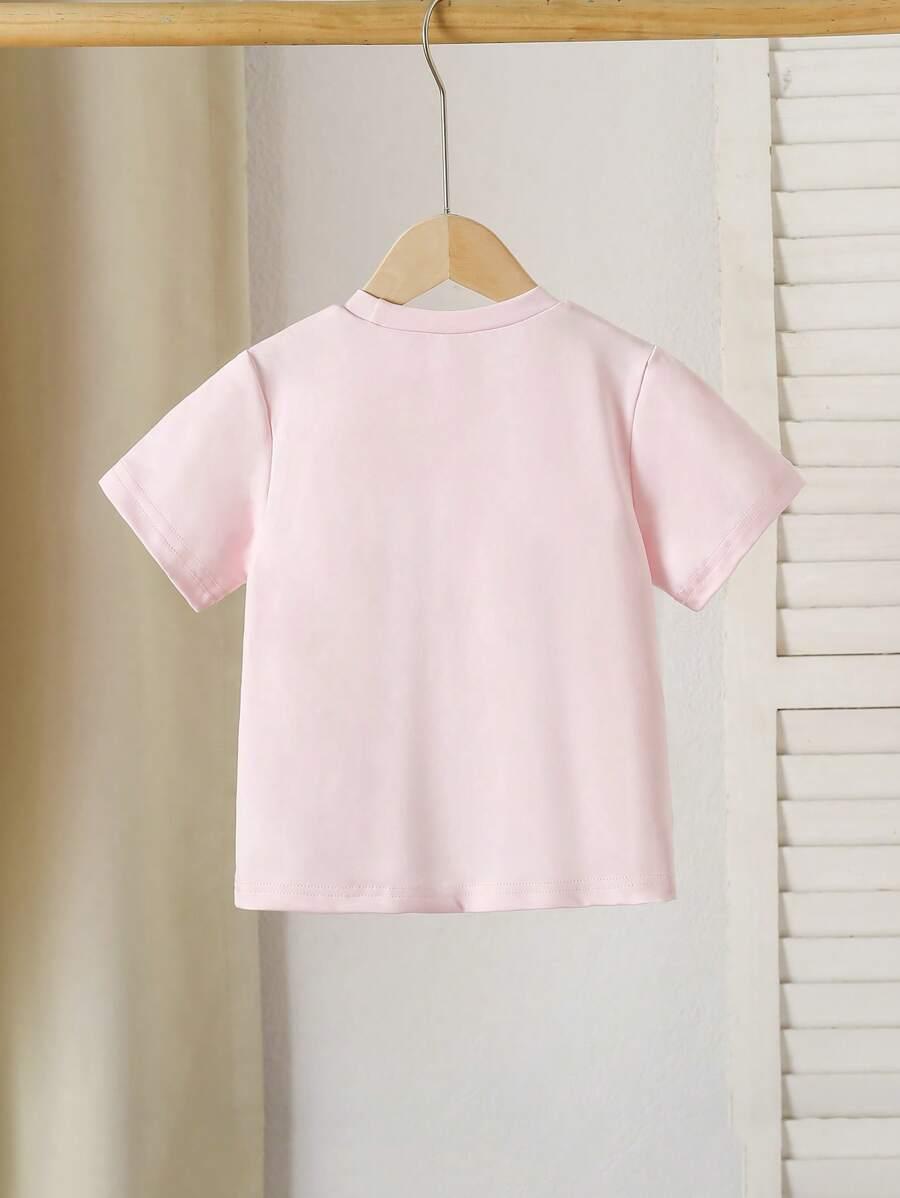 różowy t-shirt kokarda