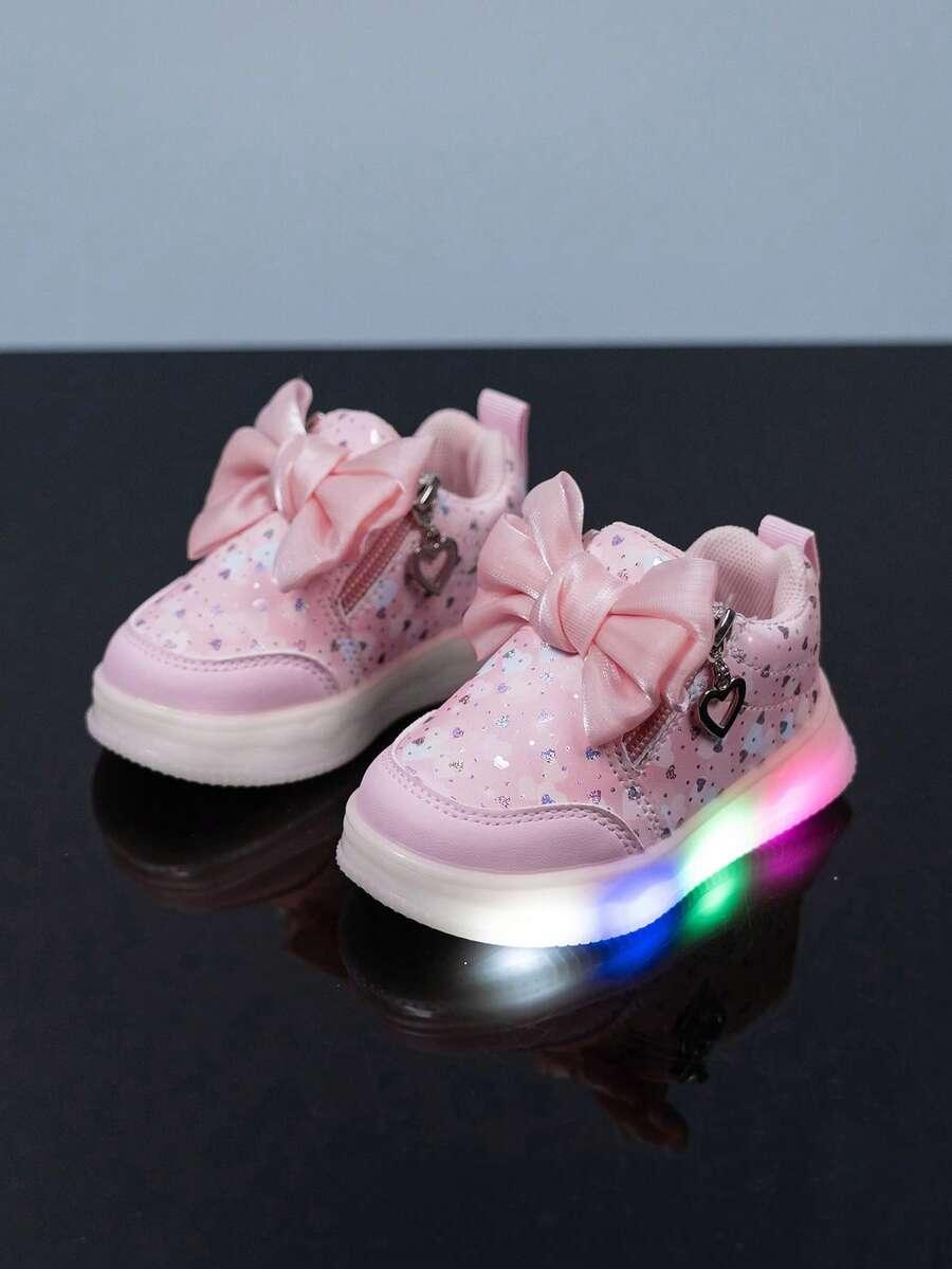różowe święcące buty