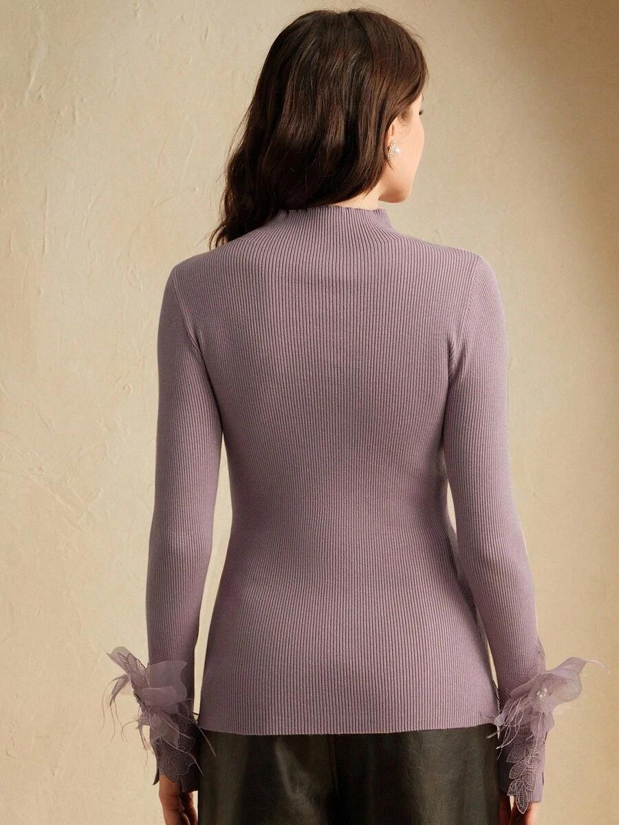 fioletowy sweter zdobienie 