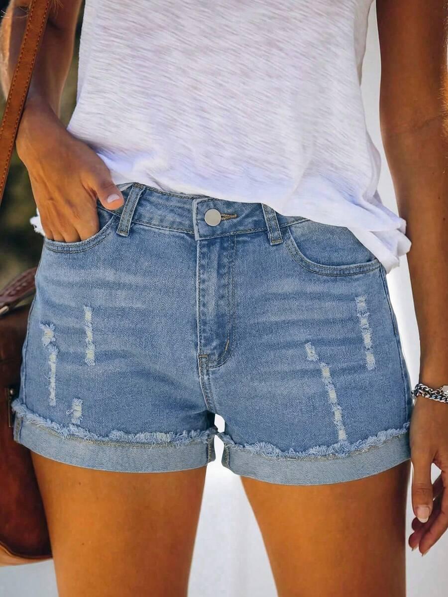 niebieskie spodenki jeans przetarcia