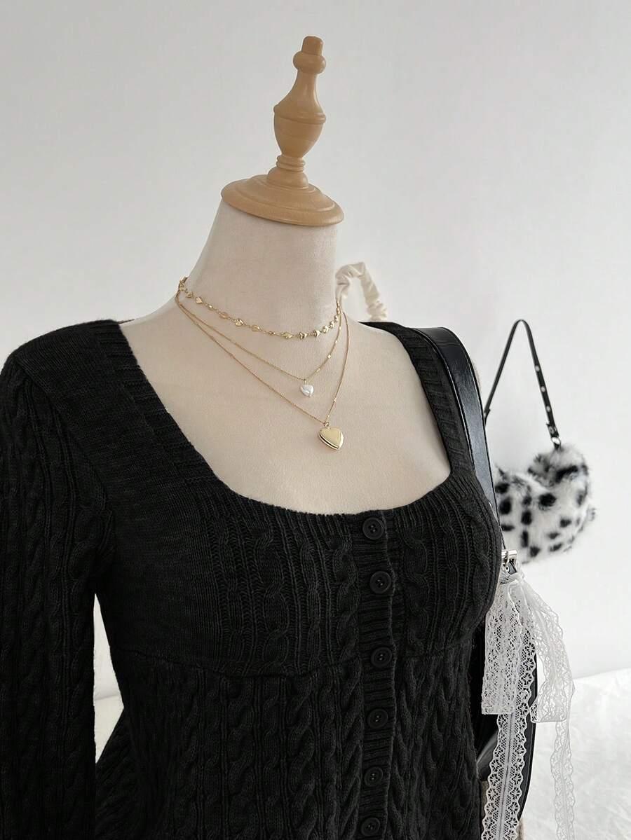 CZARNY SWETER GUZIKI