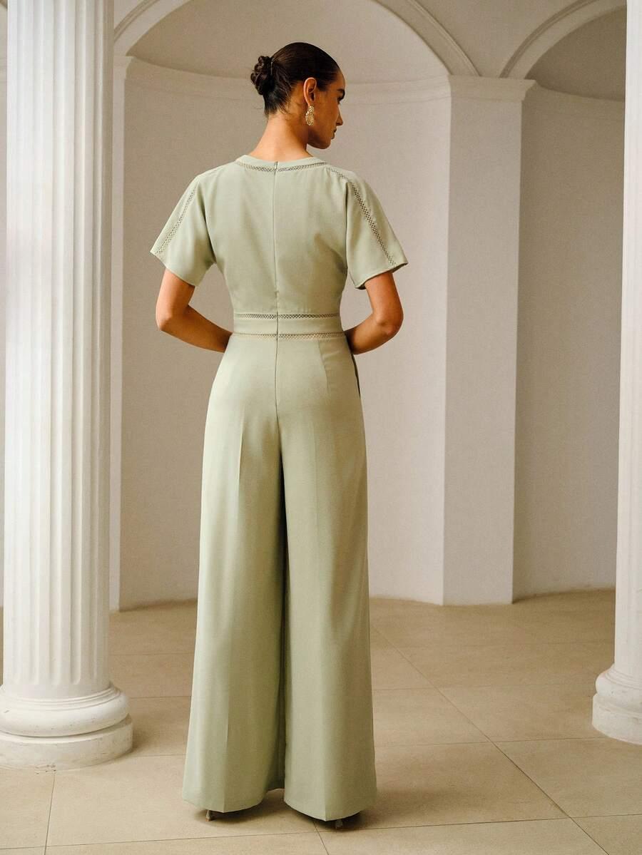 zielony kombinezon v-neck