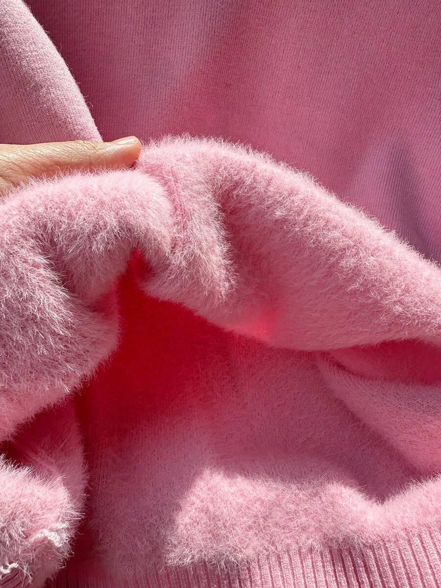 różowy sweter okrągły dekolt