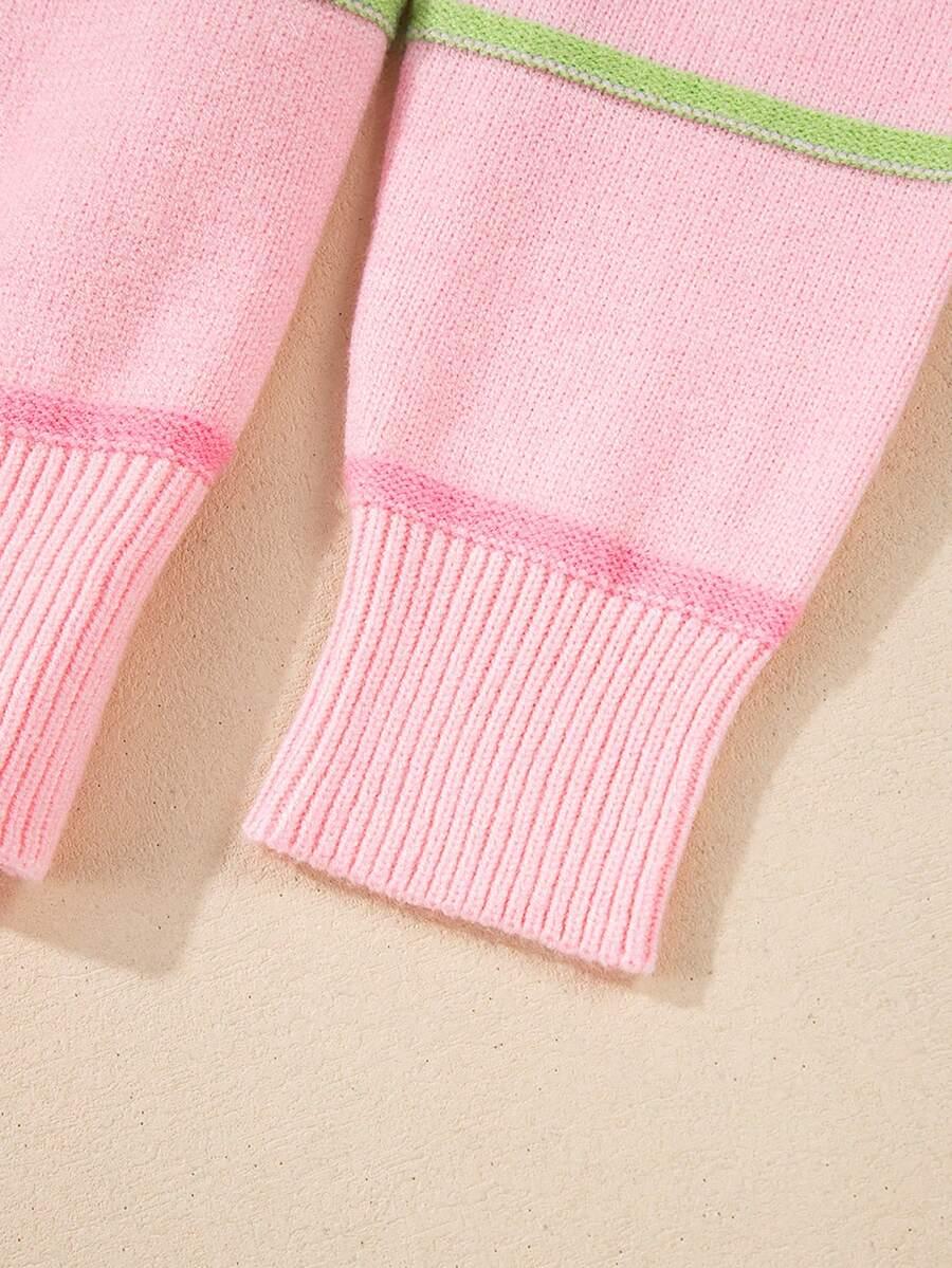 różowy sweter paski