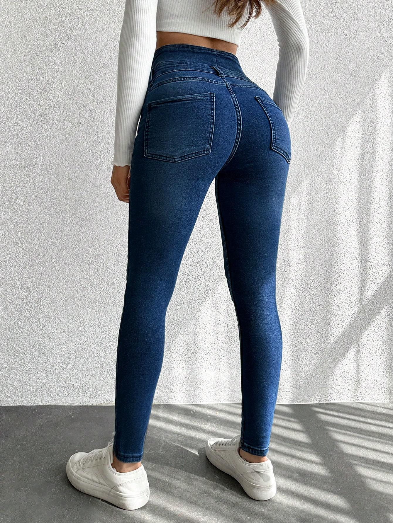spodnie jeans rurki wysoki stan guziki