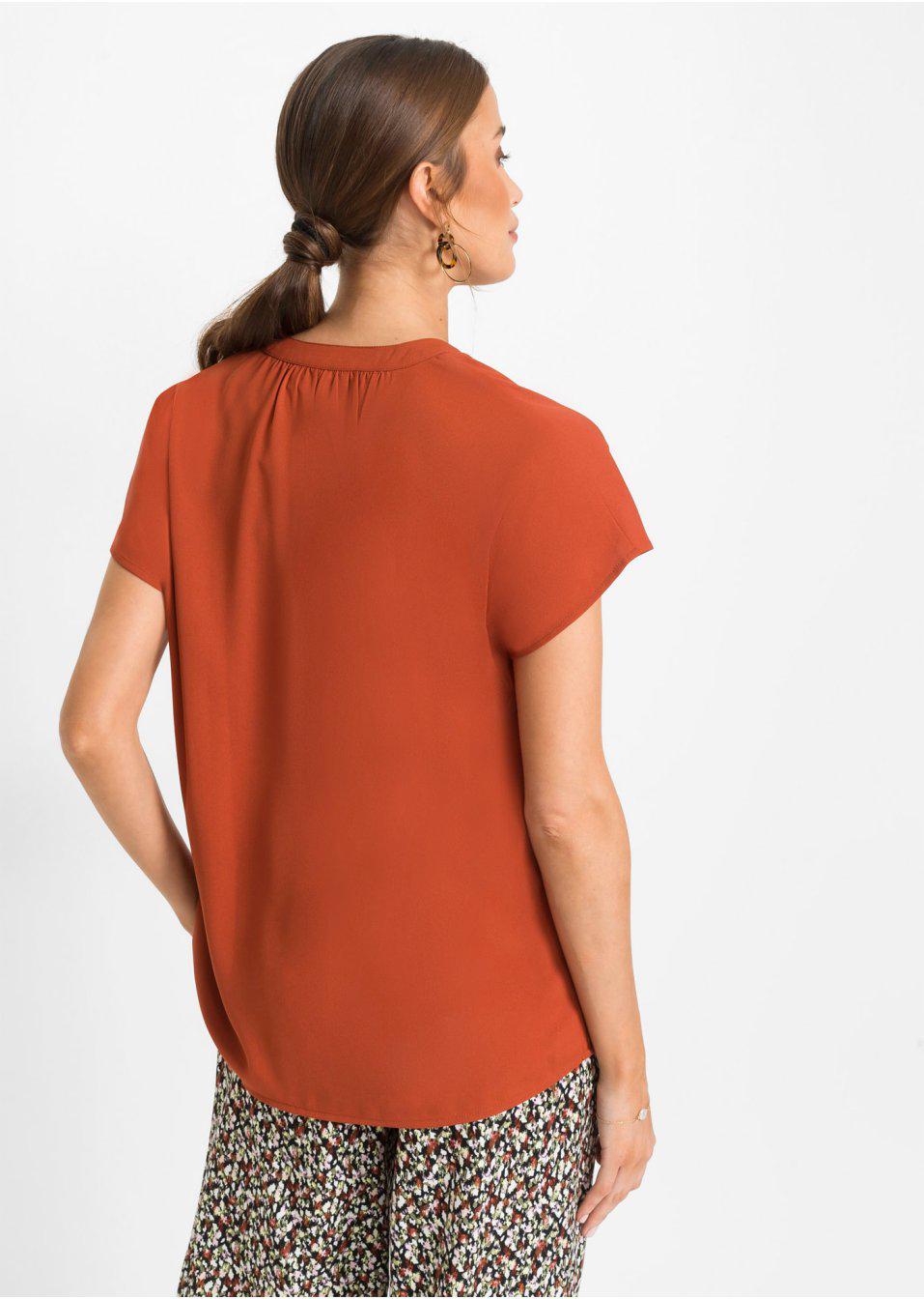 pomarańczowa bluzka v-neck
