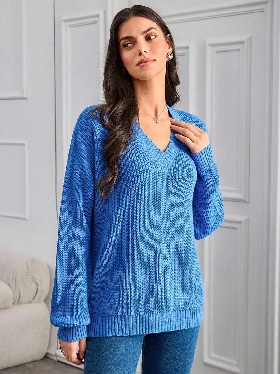 niebieski sweter v-neck