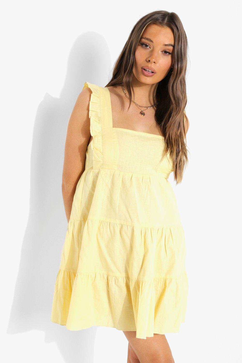 żółta mini sukienka bez rękawów falbana 