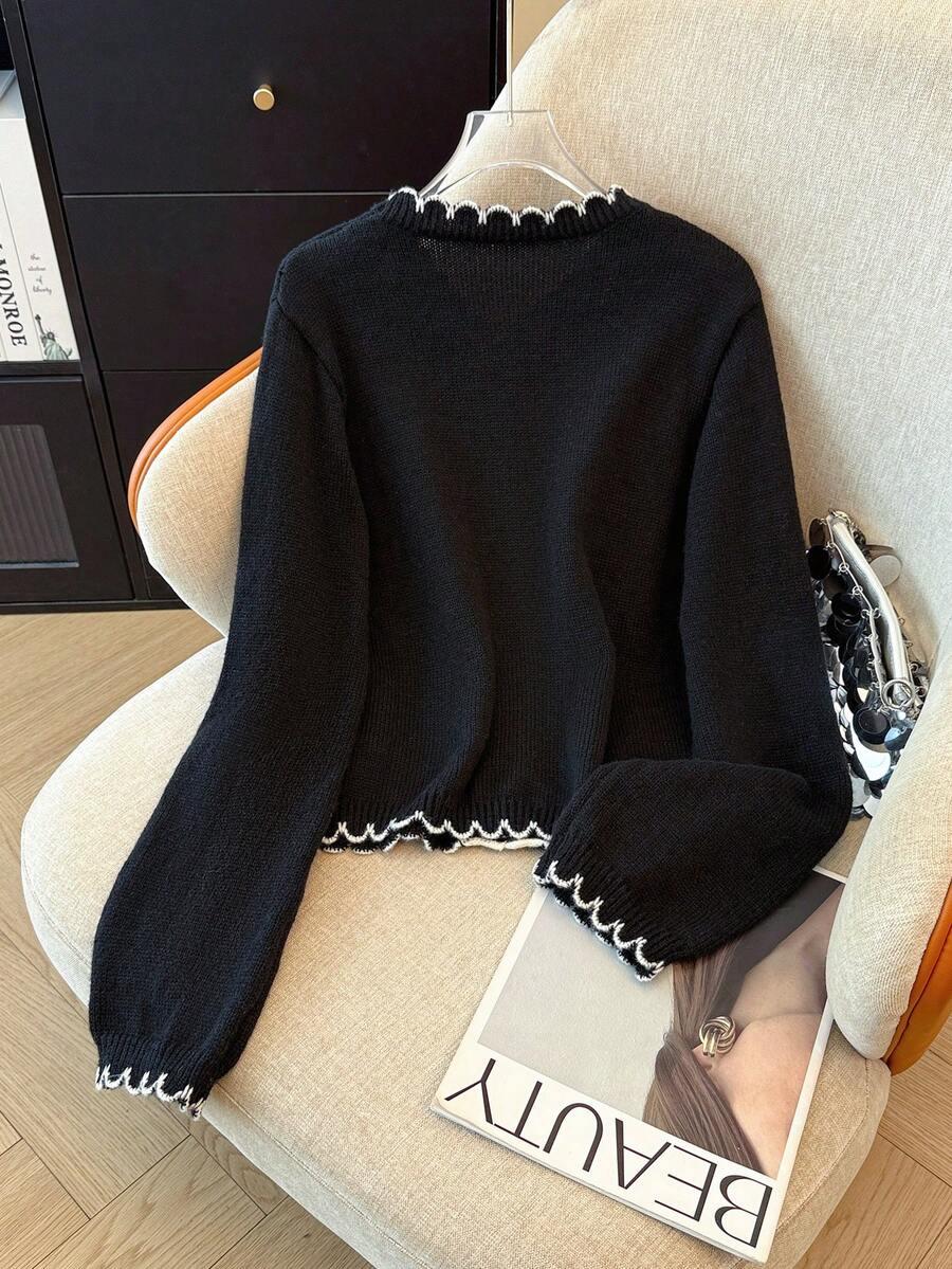 CZARNY SWETER GUZIKI