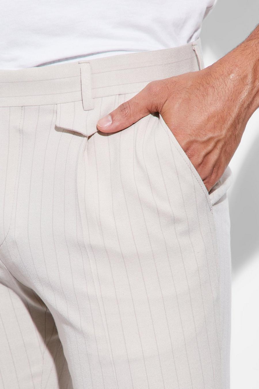beżowe spodnie casual chinosy paski