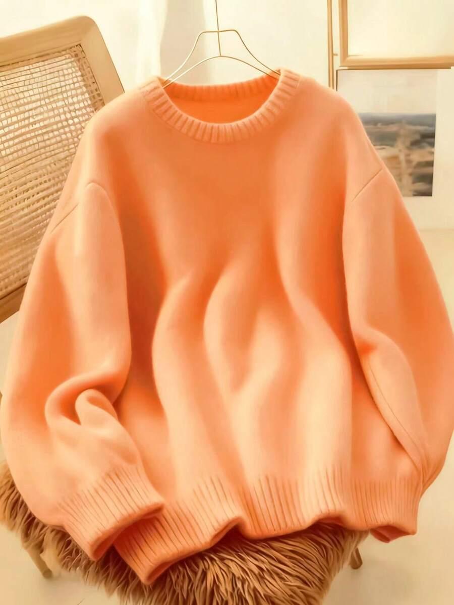 pomarańczowy dzianinowy sweter
