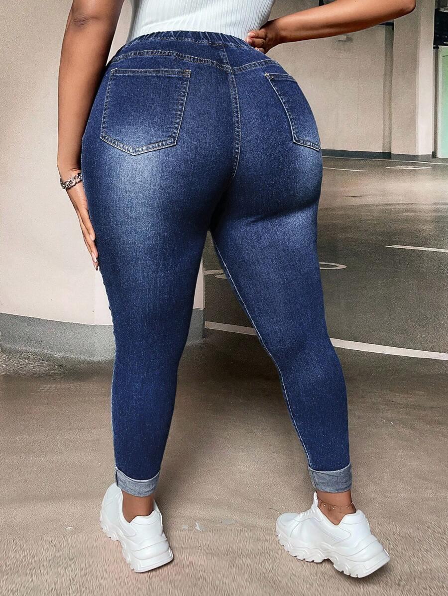 JEANSY Z PRZETARCIAMI DAMSKIE