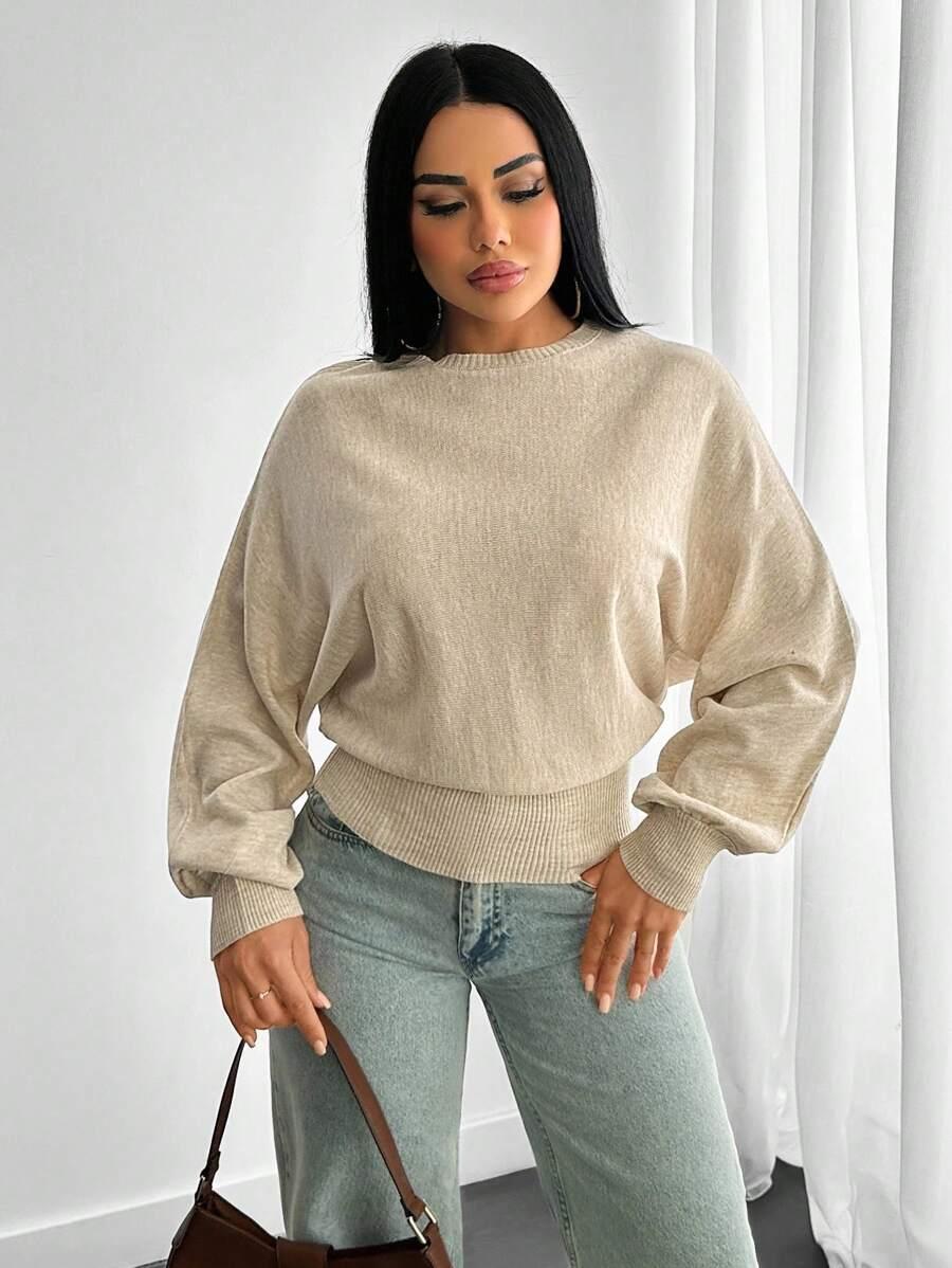 beżowy dzianinowy sweter 