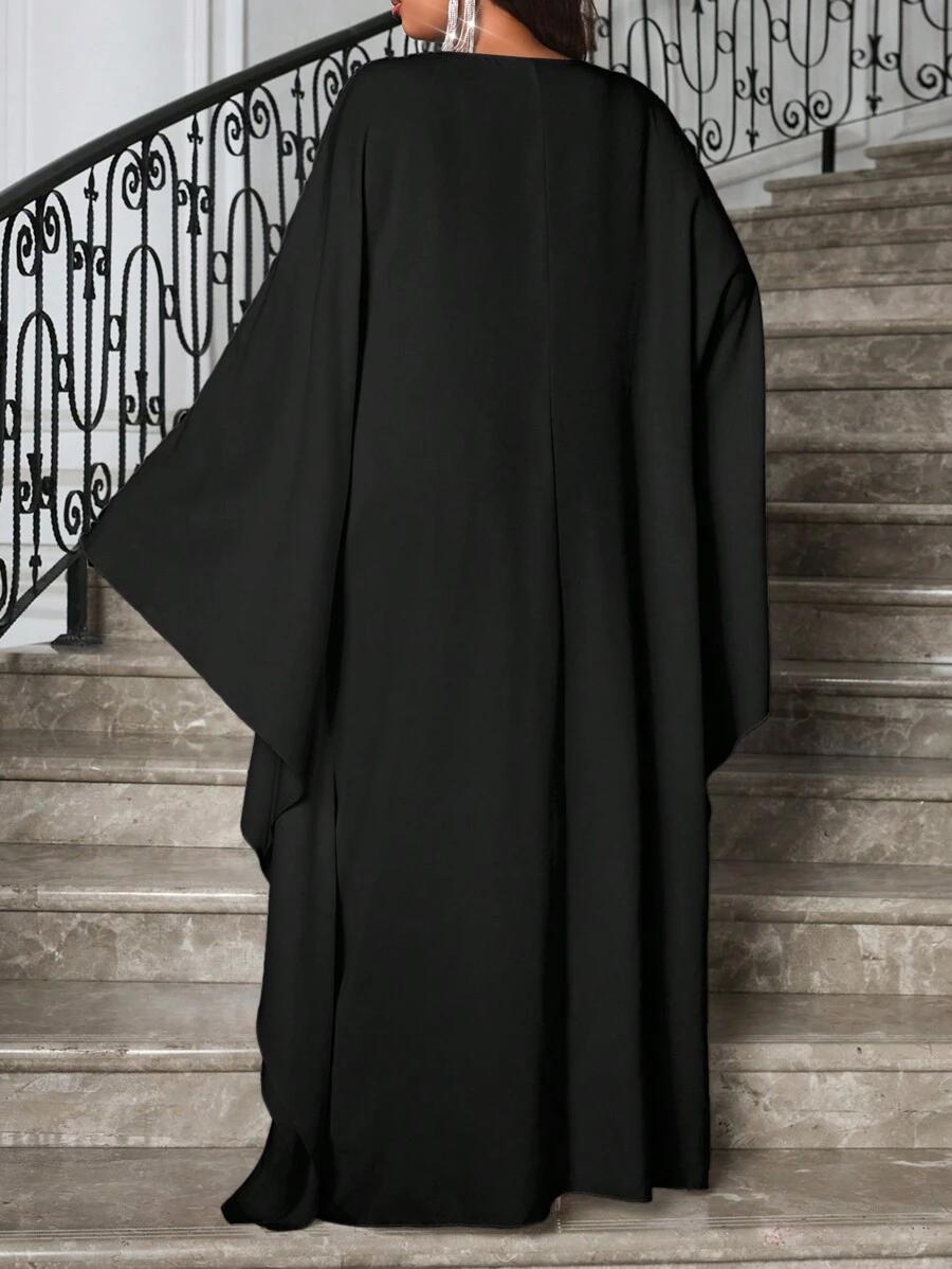 czarna sukienka oversize szerokie rękawy