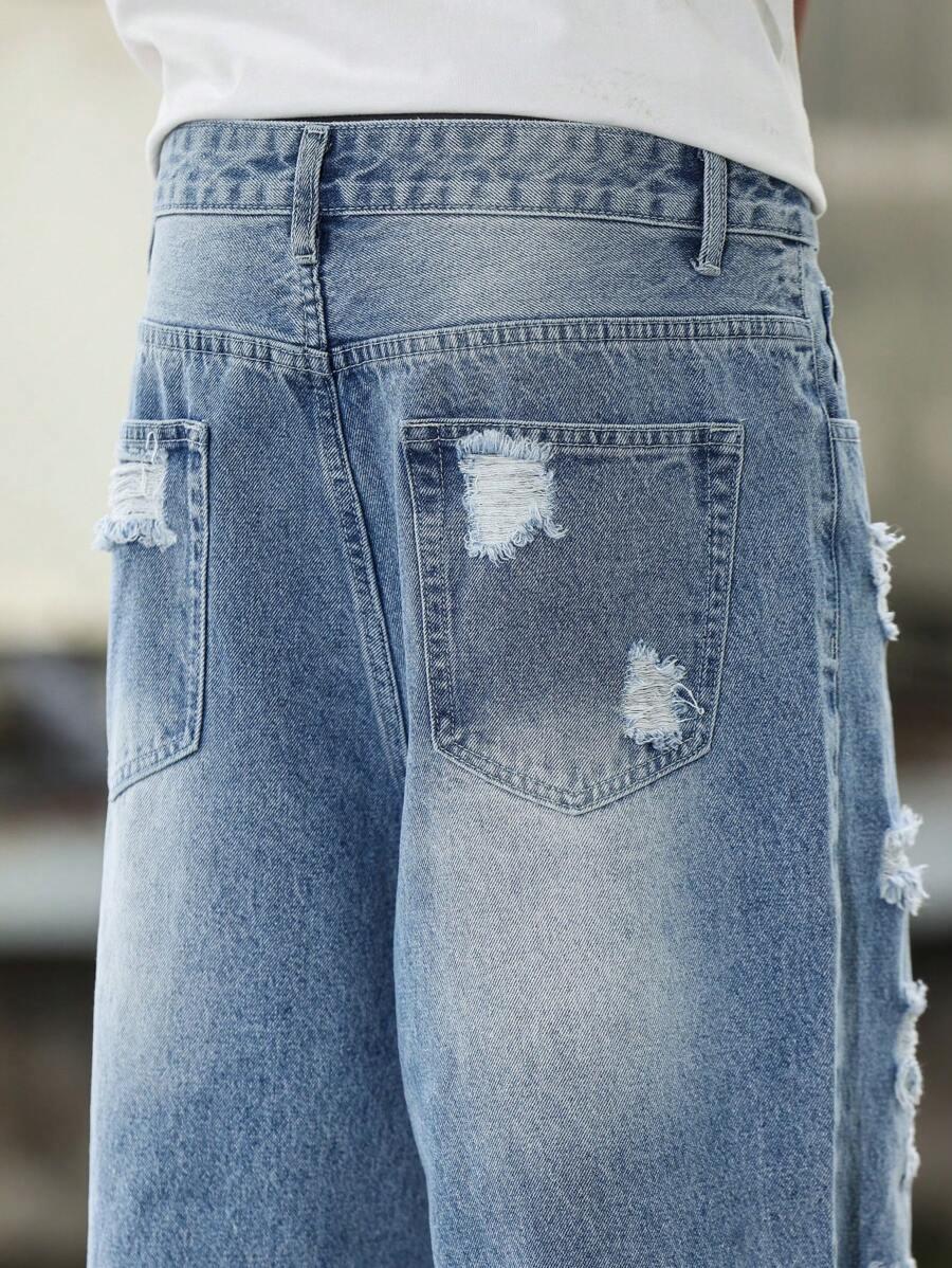 niebieskie spodnie jeans