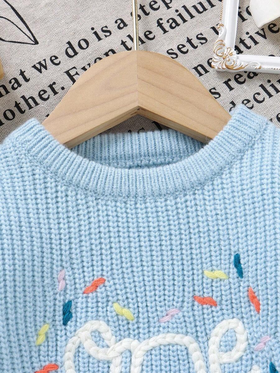 niebieski sweter haft