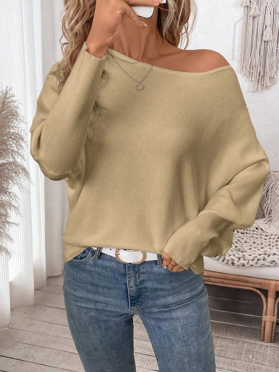 beżowy luźny sweter 