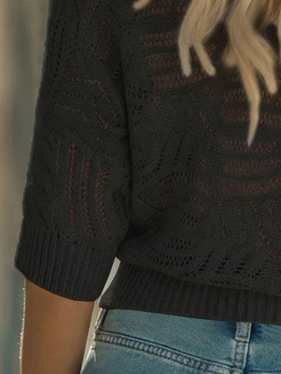 czarny sweter wycięcia