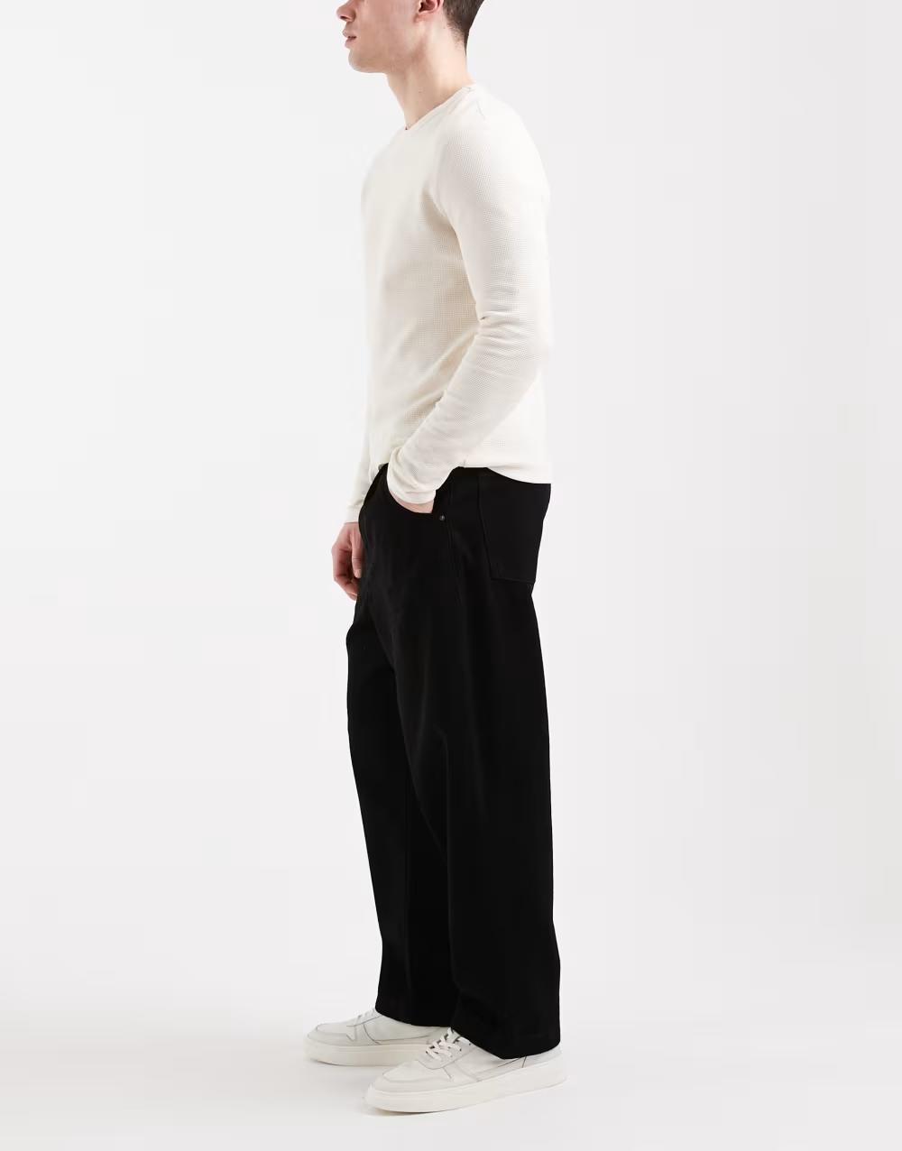 czarne spodnie jeans zamek
