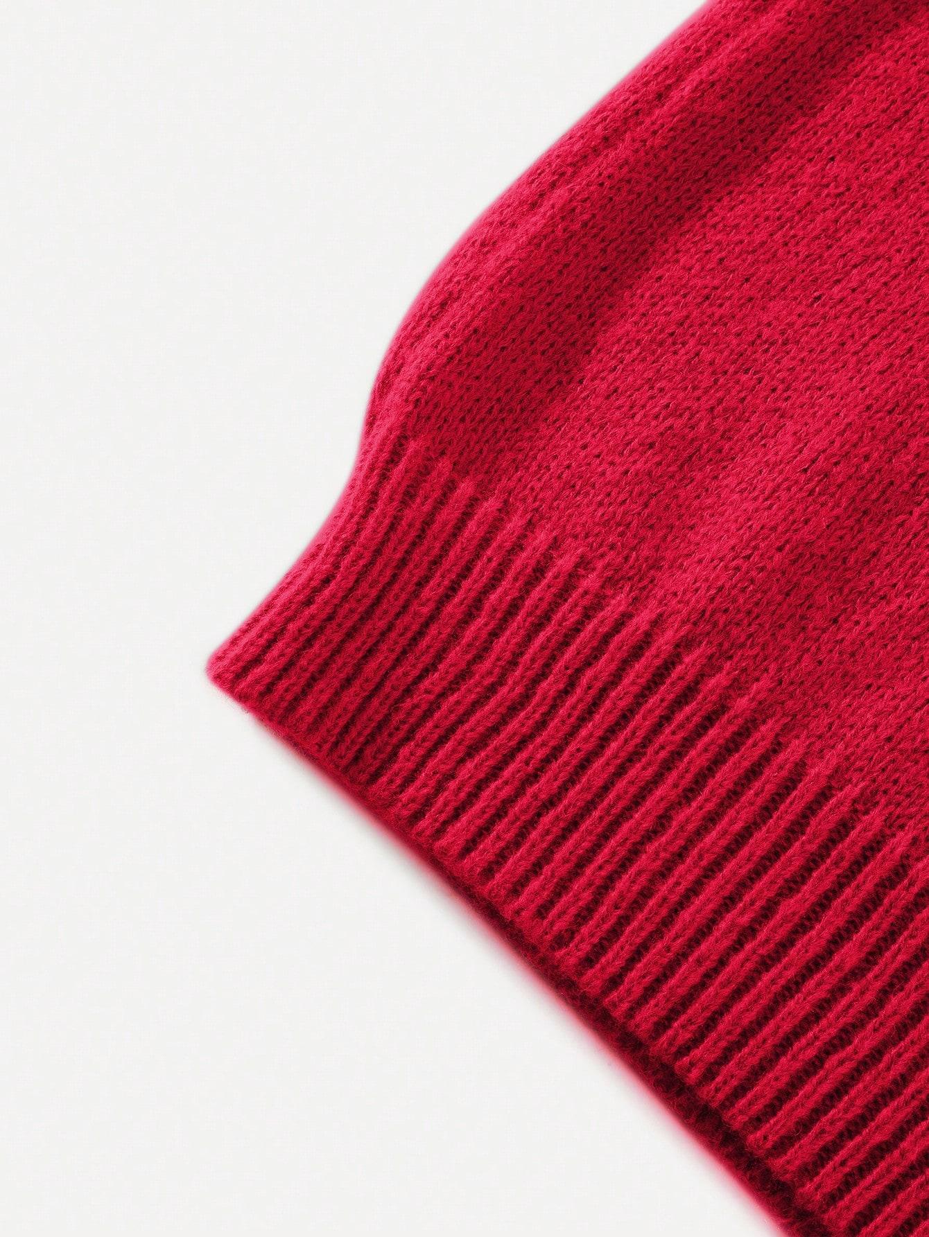 czerwony sweter zdobienie