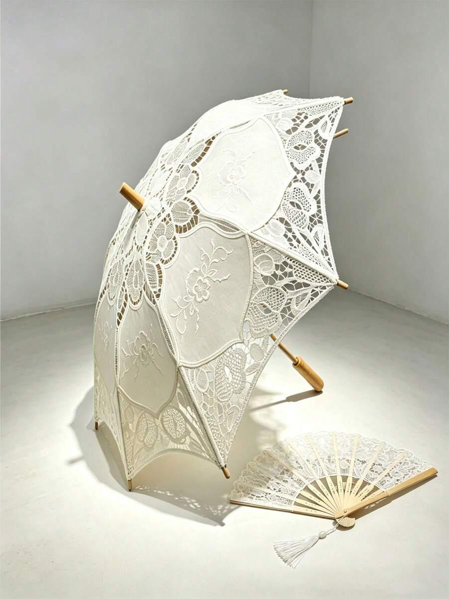 Biały koronkowy parasol przeciwsłoneczny