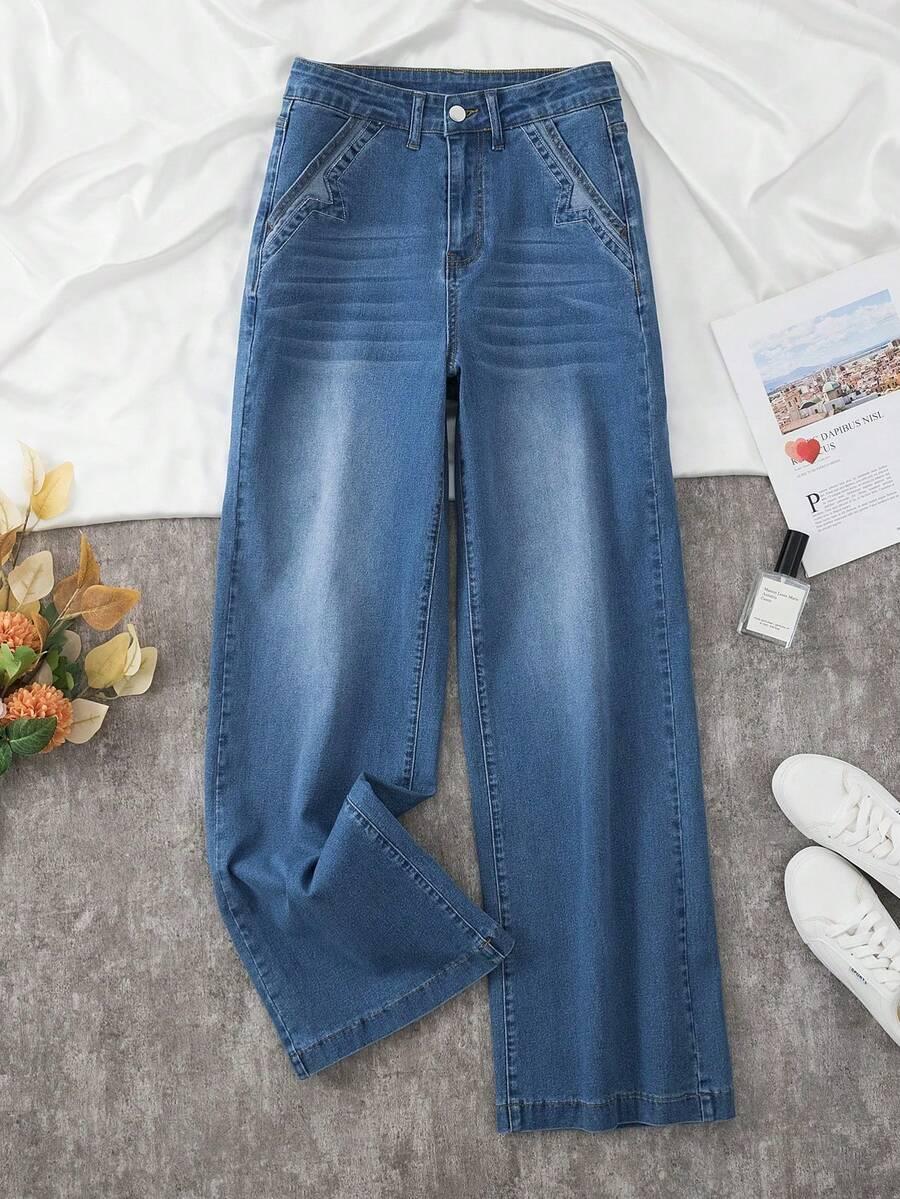 niebieskie spodnie jeans