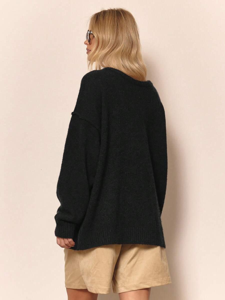 Czarny sweter oversize
