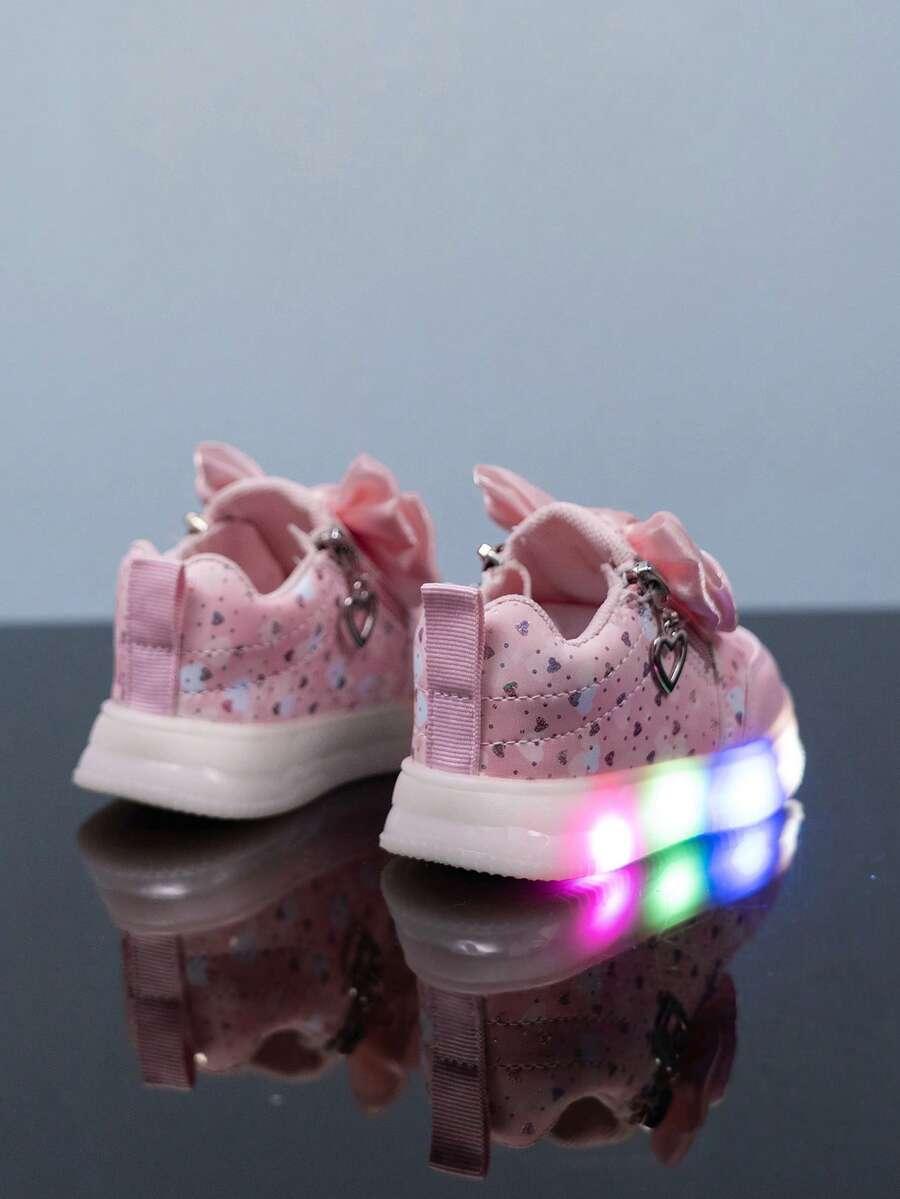 różowe święcące buty