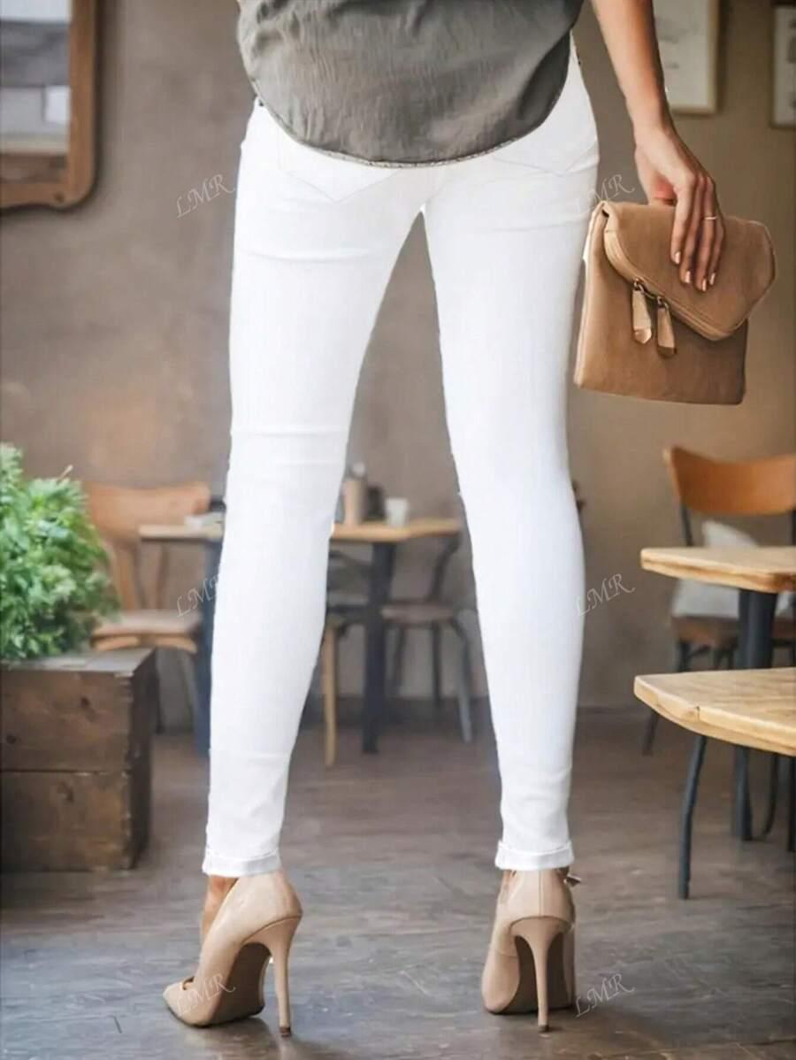 BIAŁE SPODNIE JEANS RURKI
