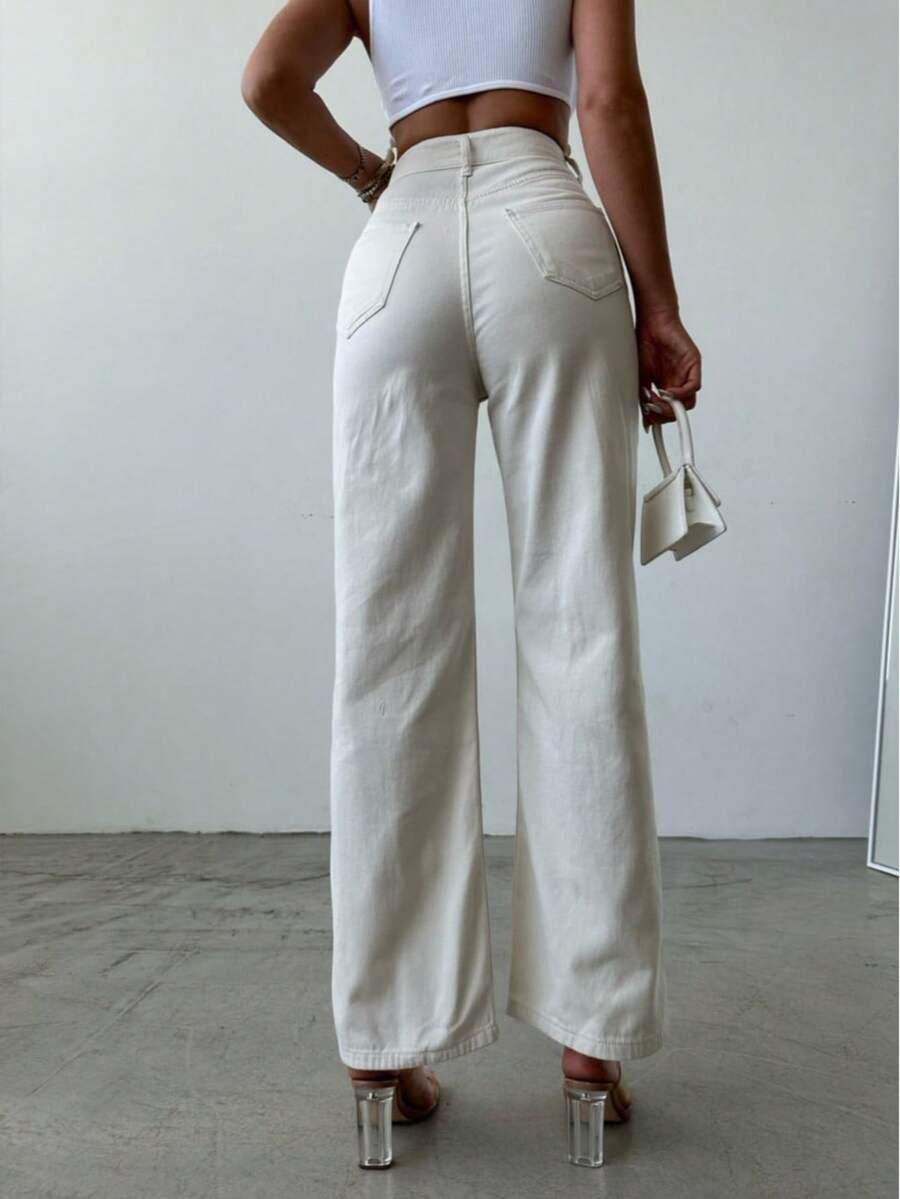kremowe spodnie jeans
