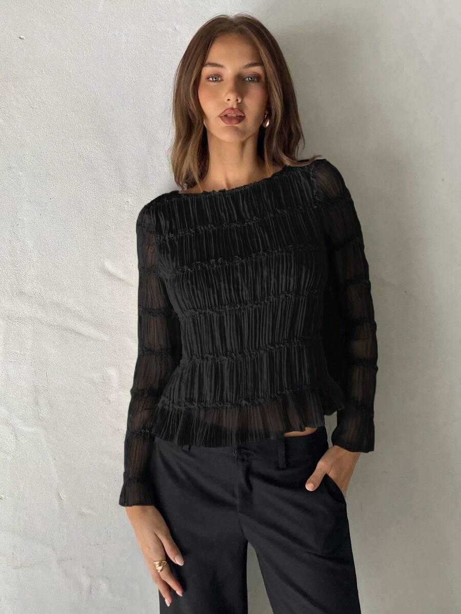 czarna bluzka falbanki