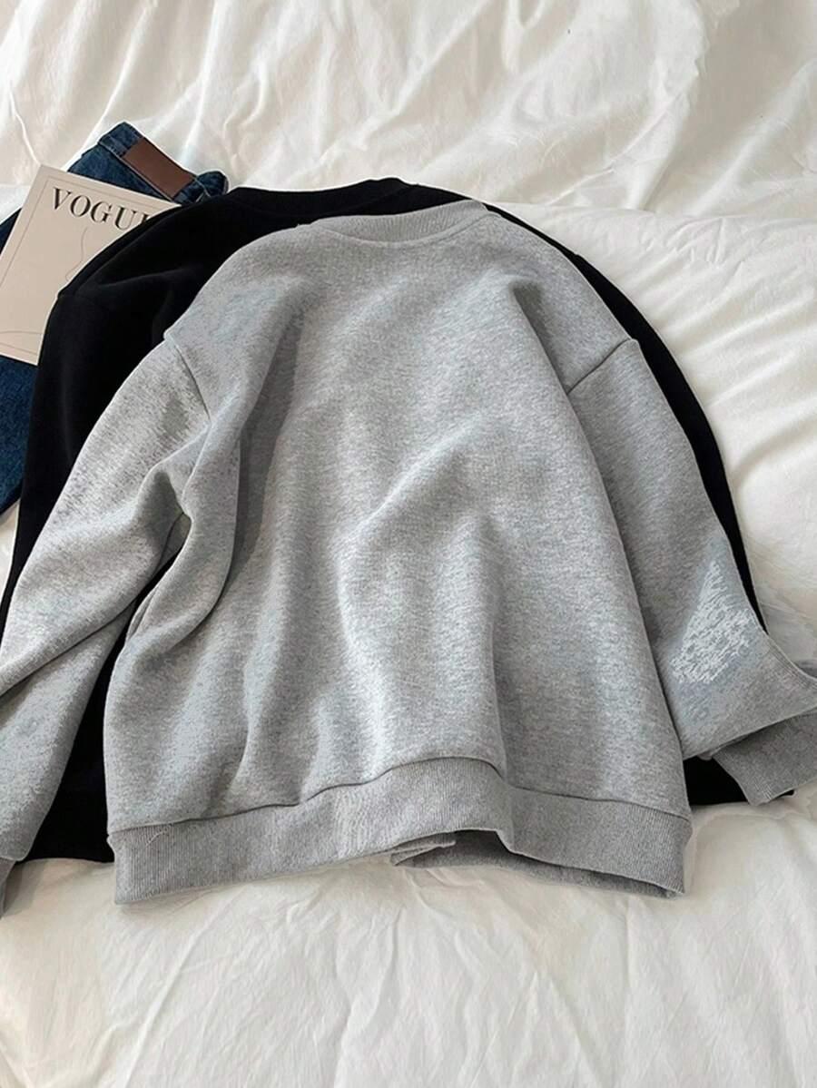 szara bluza bomber guziki