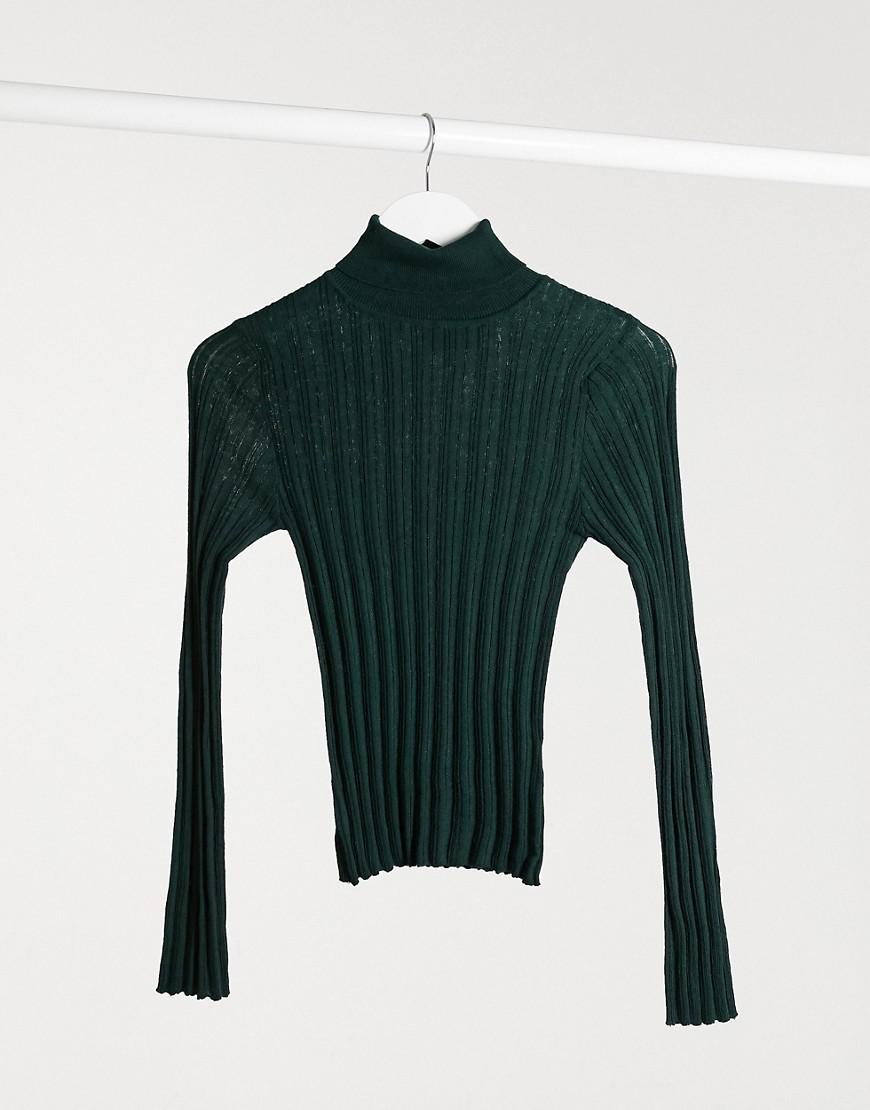 zielony dopasowany sweter prążki