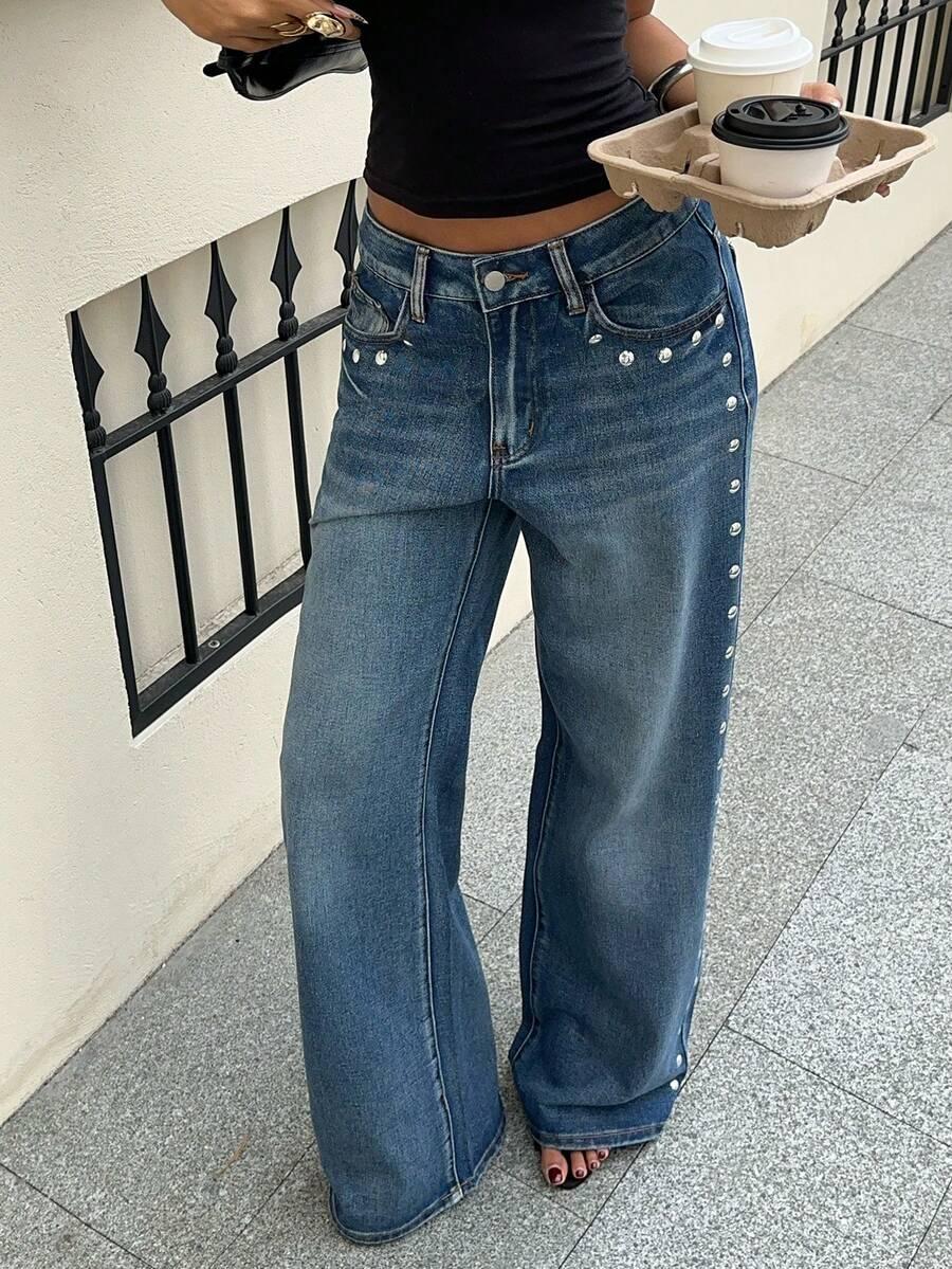 niebieskie spodnie jeans kieszenie 