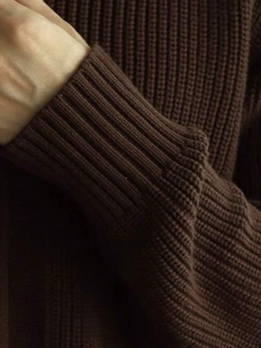 brązowy sweter zamek