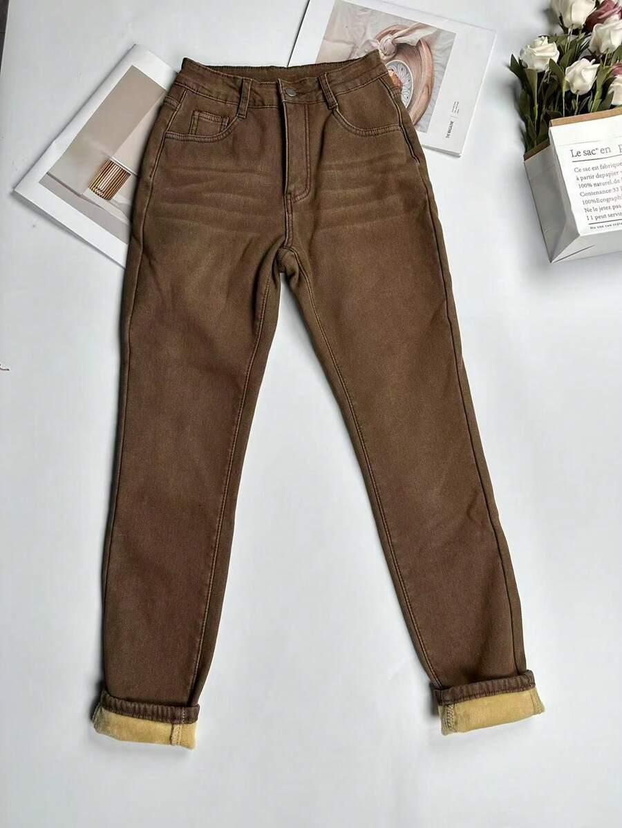 brązowe spodnie jeans ocieplane