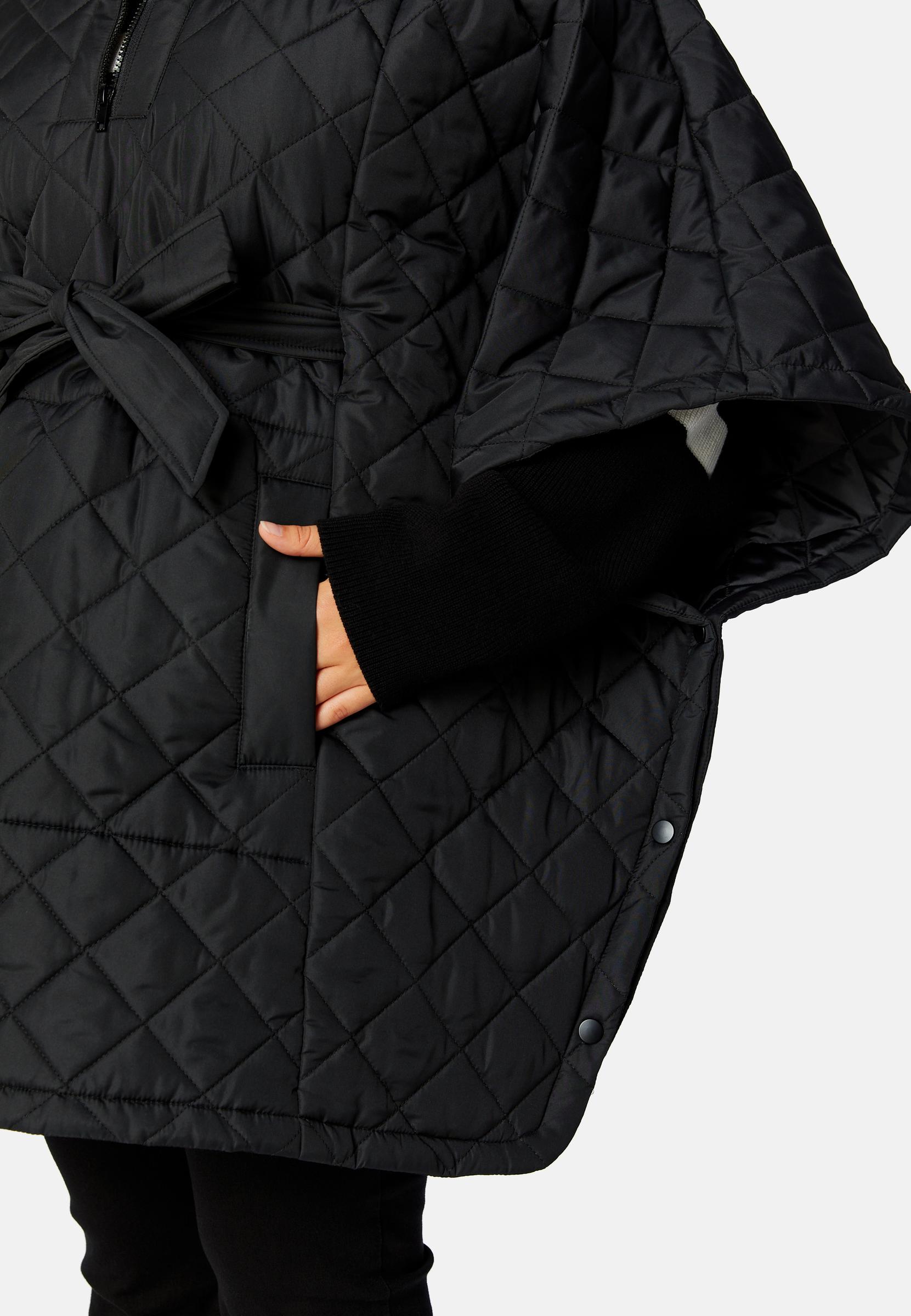 czarna pikowana kurtka oversize ponczo wiązanie