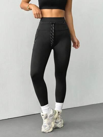 czarne legginsy sportowe