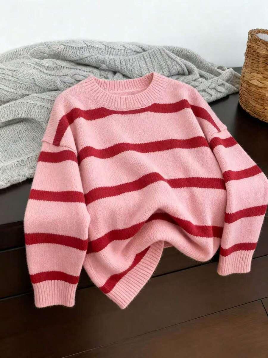 RÓŻOWY SWETER PASKI