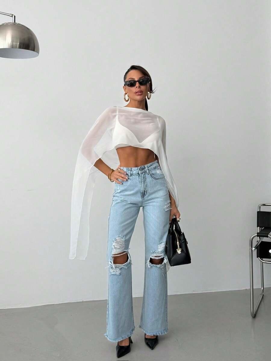 niebieskie spodnie jeans przetarcia